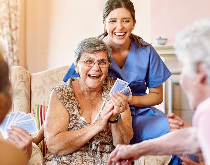 Cropped shot of seniors playing cards in their retirement home